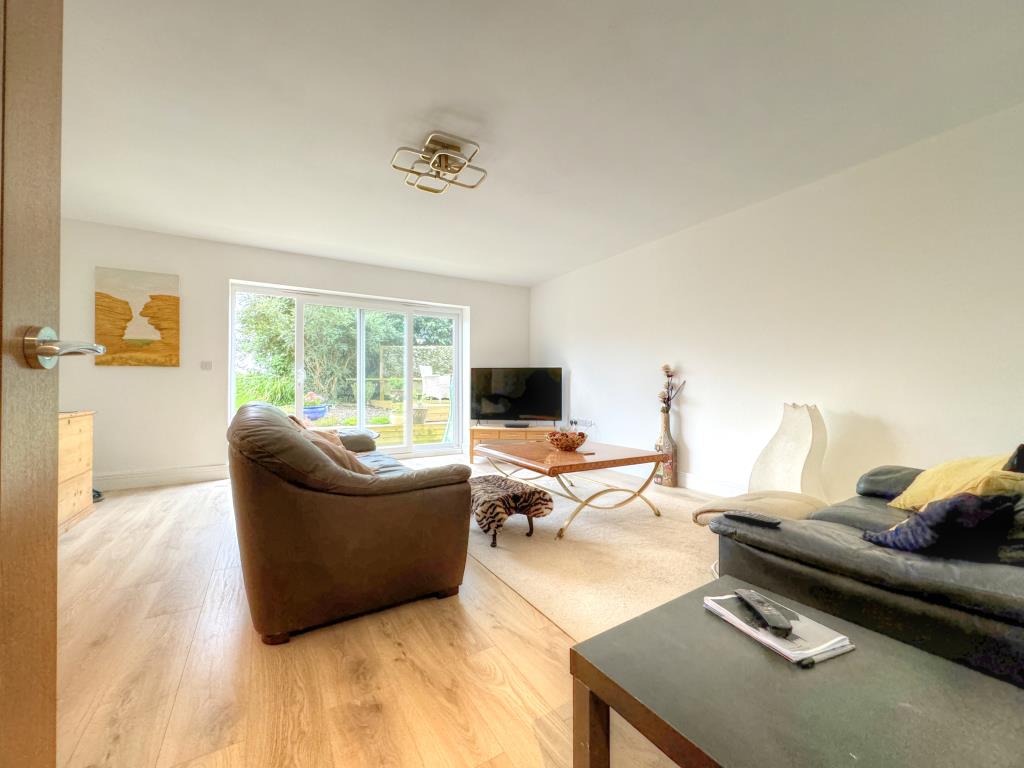 Lot: 142 - THREE-BEDROOM NEW BUILD HOME - Sitting Room, with views of the garden
